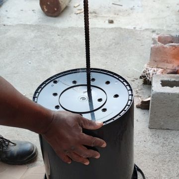Burning holes with hot metal stick