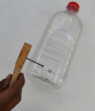 Make a hole in the bottle
