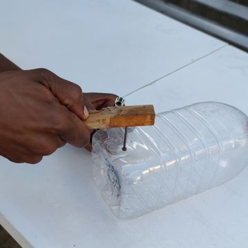 Make a hole in the bottle