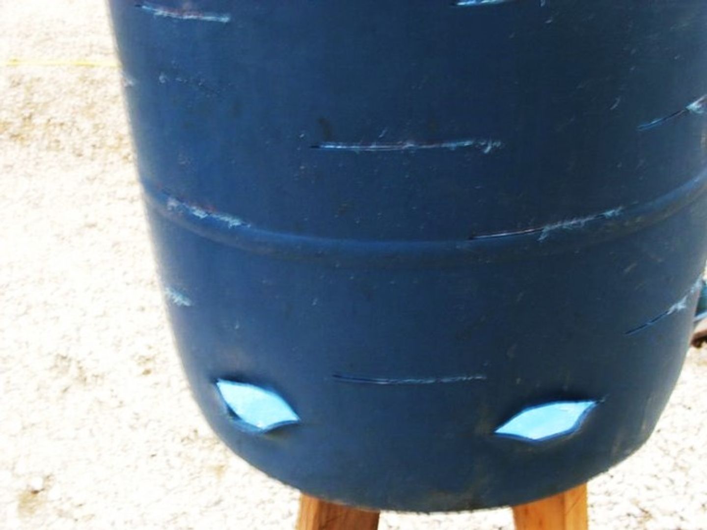Barrel with marked lines and already two holes in the sides
