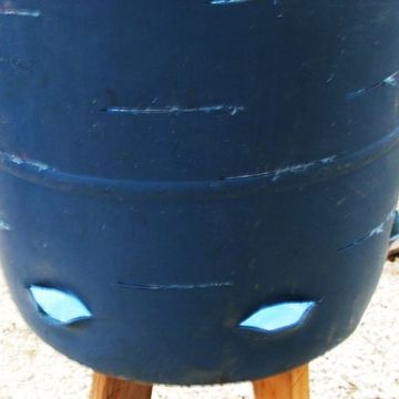 Barrel with marked lines and already two holes in the sides