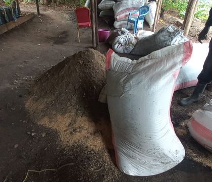 Bags with soil and manure ready to add to pile