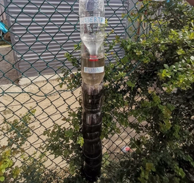 Mount the funnel in the top middle bottle and the tank in the funnel.