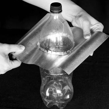 Insert the bottle into the metal sheet