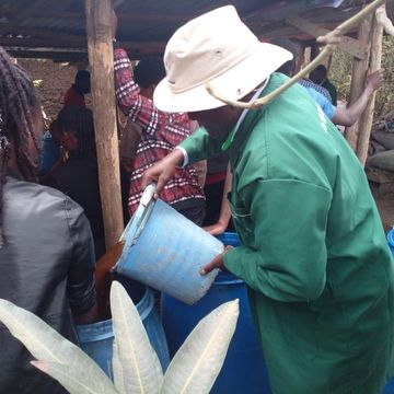 Pouring the mixture into drums