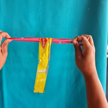 Form 2 rings into T shape